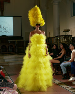 Runway model in yellow dress